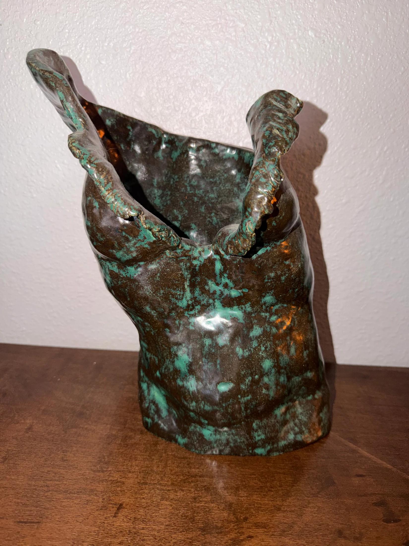 Patinated figurative sculpture by Sel Tasteme viewed from a second angle.
